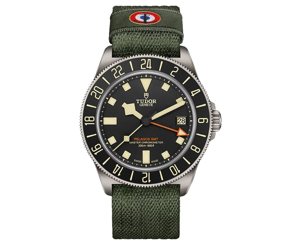 Tudor watch with green strap and black dial on a white background
