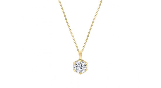 a yellow gold pendant necklace with a diamond center stone by Michael M