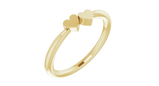 A delicate yellow gold fashion ring featuring two heart motifs, available at Lewis Jewelers.