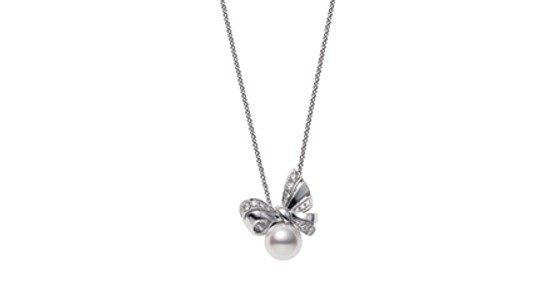 A white gold pendant necklace with a bow motif and a single pearl, available at Lewis Jewelers.
