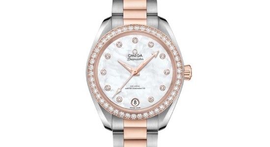 A mixed metal watch by Omega with diamond accents, available at Lewis Jewelers.