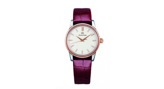 A mixed metal Grand Seiko watch with a rose gold case and purple strap, available at Lewis Jewelers.