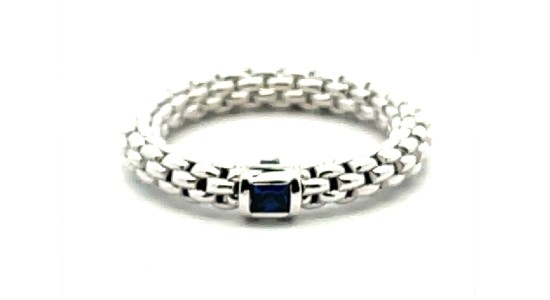 A white gold diamond mesh designed ring on a white background