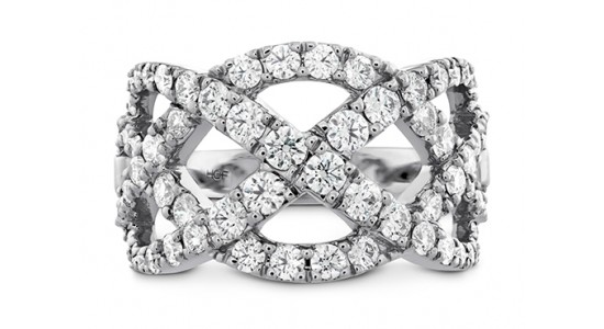 A triple diamond white gold ring against a white background