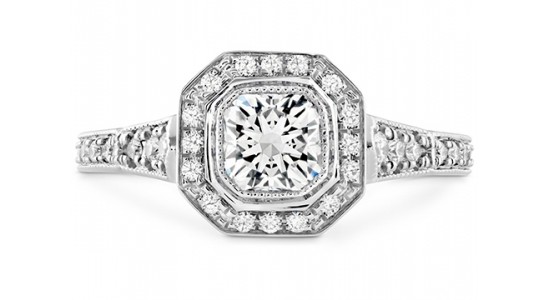 an art deco inspired engagement ring with a bezel setting