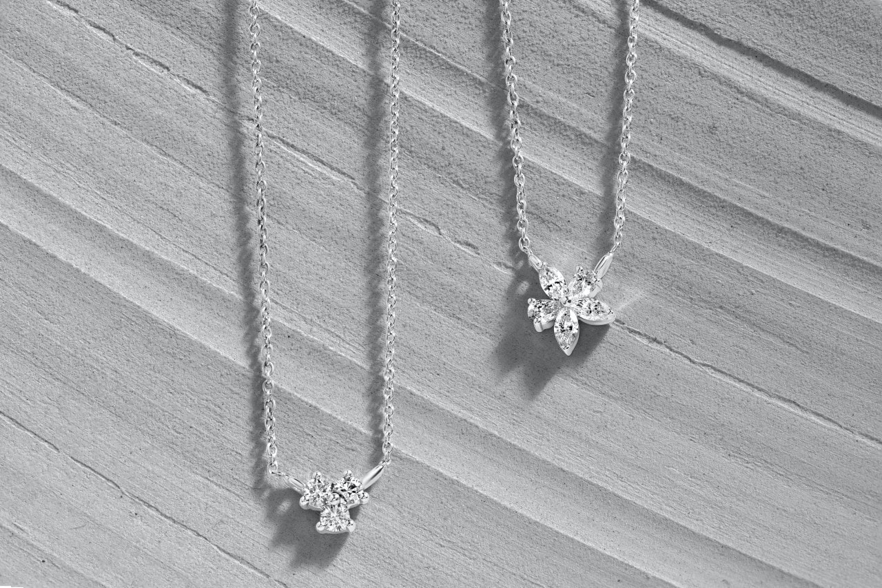 diamond necklaces on cement background diamond necklaces on cement background