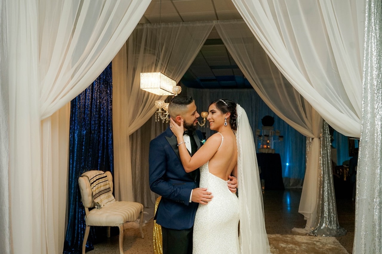 Happy couple with modern wedding bands Happy couple with modern wedding bands
