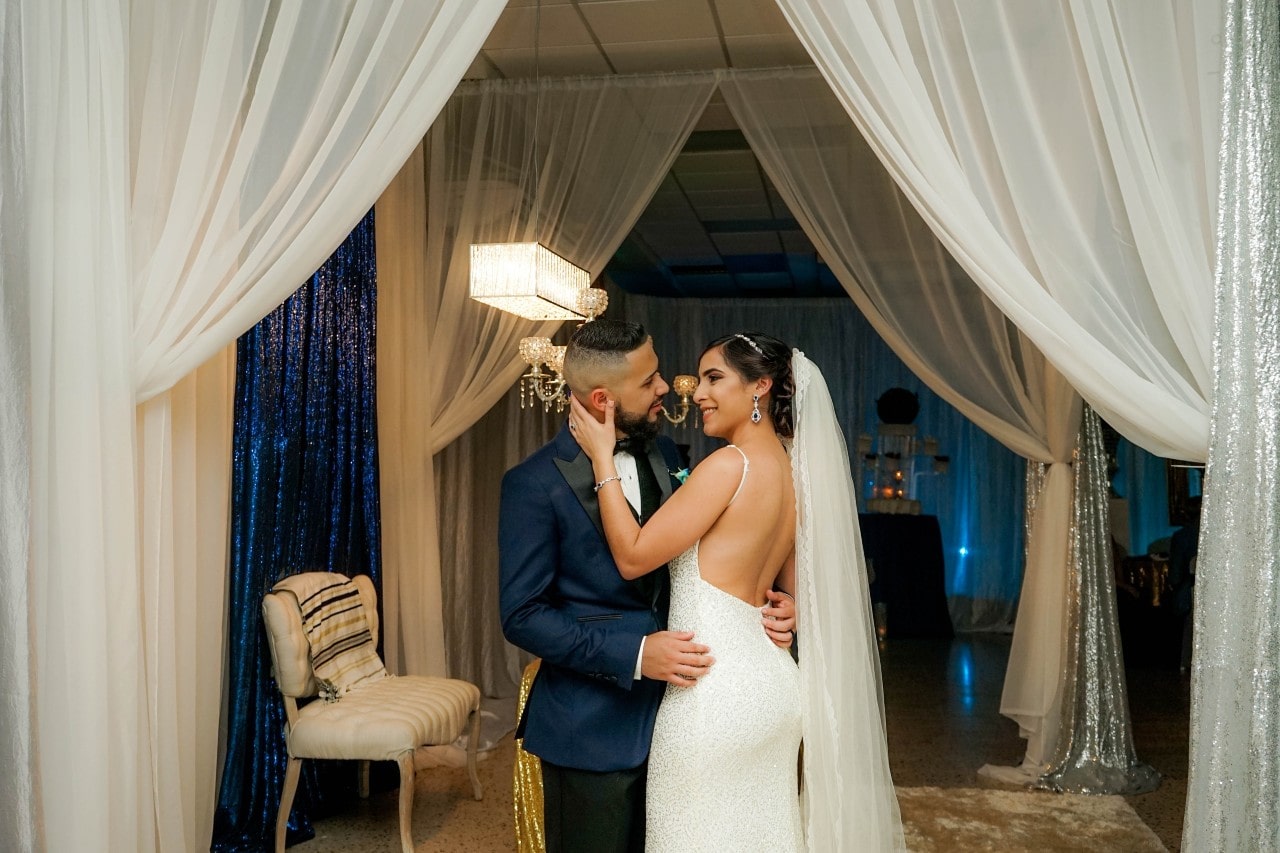 Happy couple with modern wedding bands